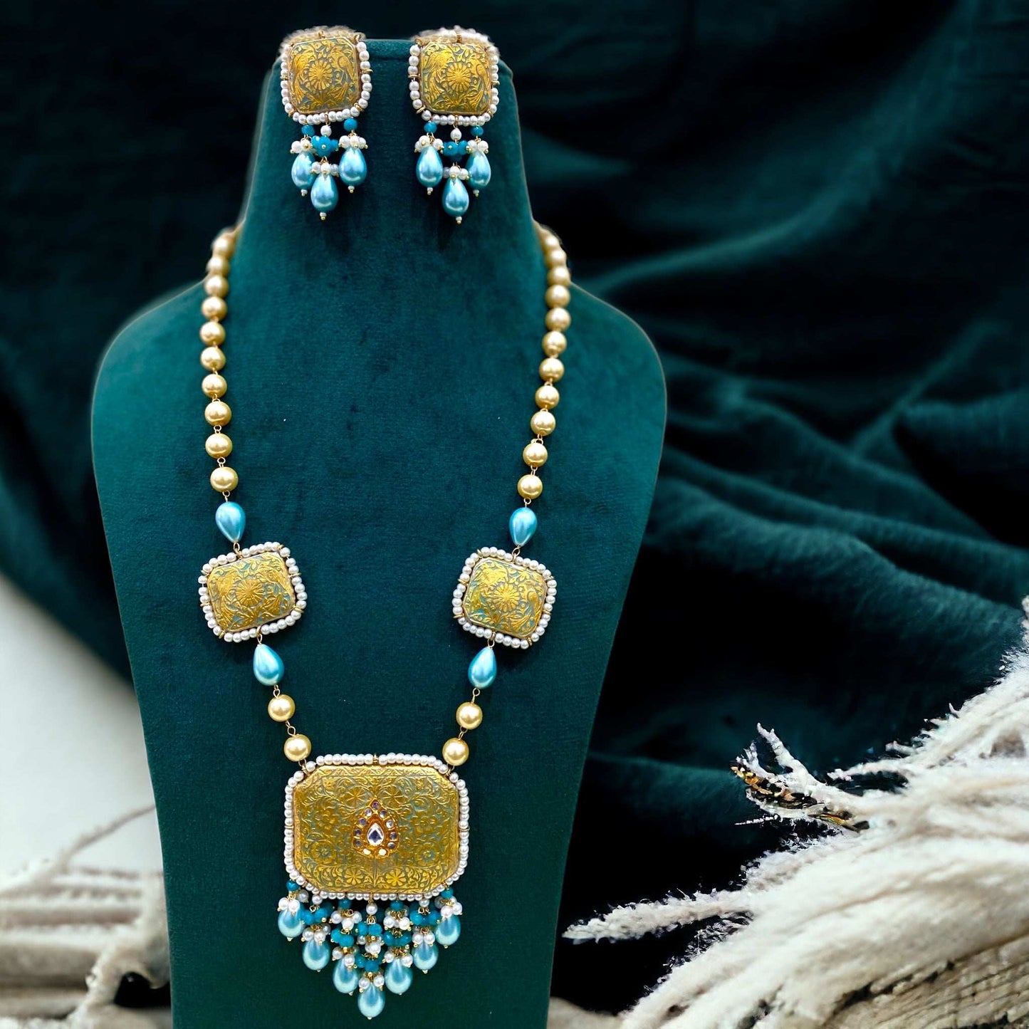 Rania Turquoise Meenakari
Necklace Set - Pirohee by parul sharma