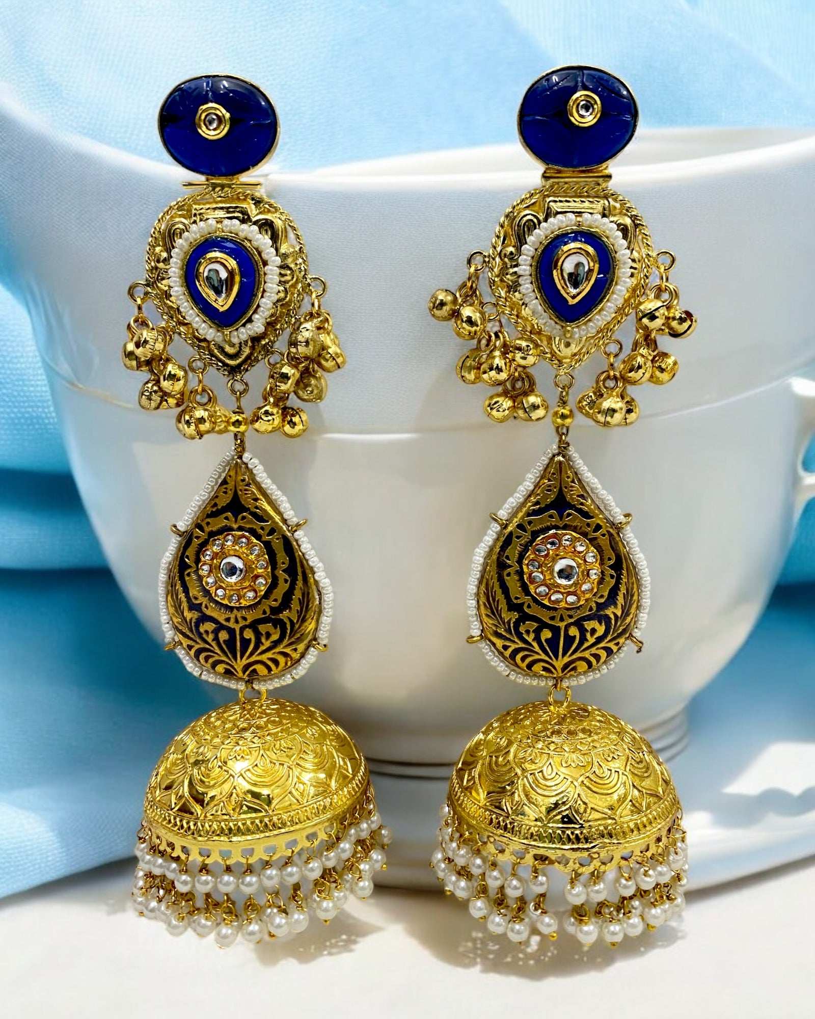 Gulmina Blue Jhumka
Earrings - Pirohee by parul sharma