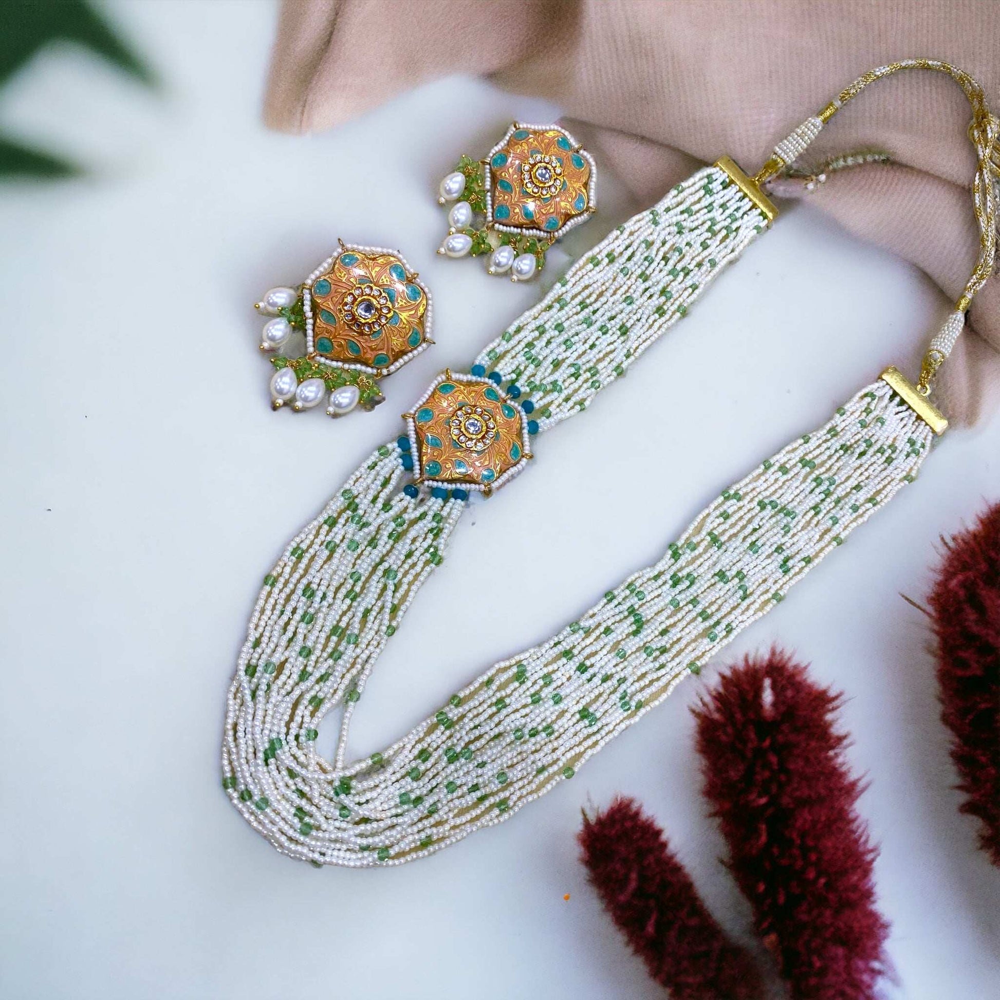 Saira Peach Meenakari
Necklace Set - Pirohee by parul sharma