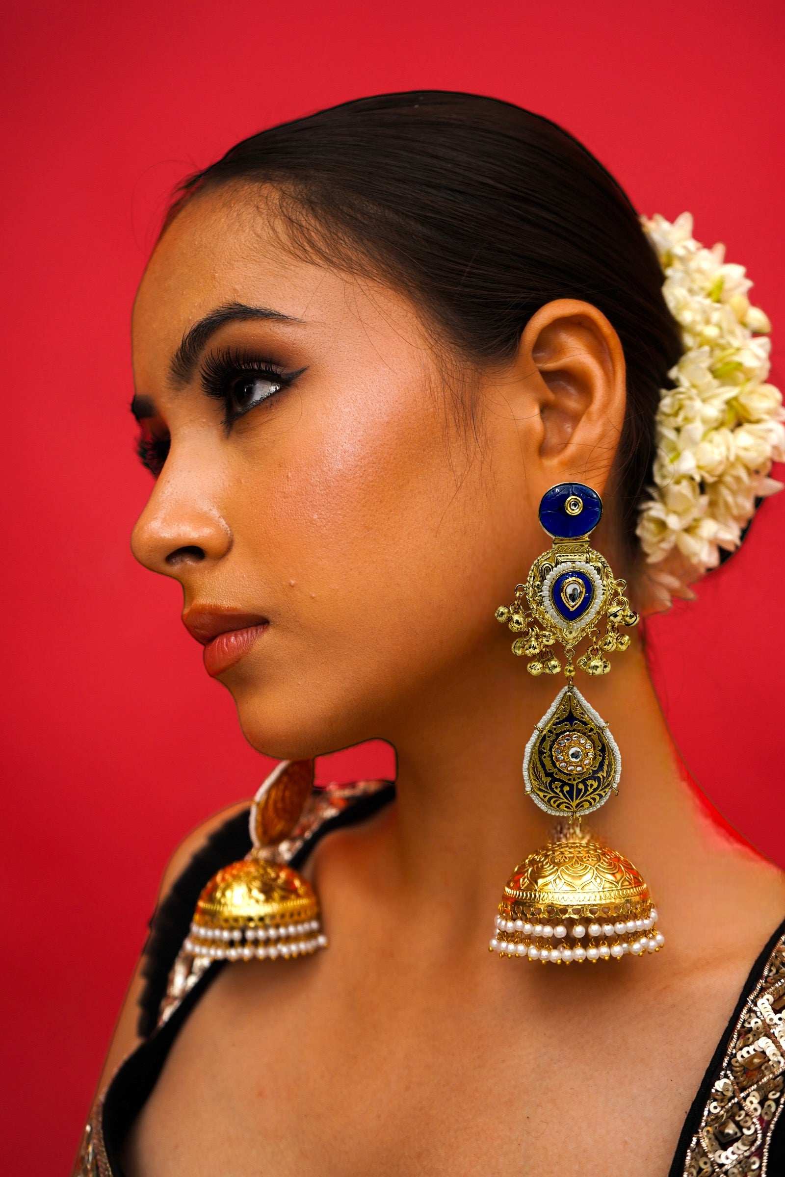 Gulmina Blue Jhumka
Earrings - Pirohee by parul sharma