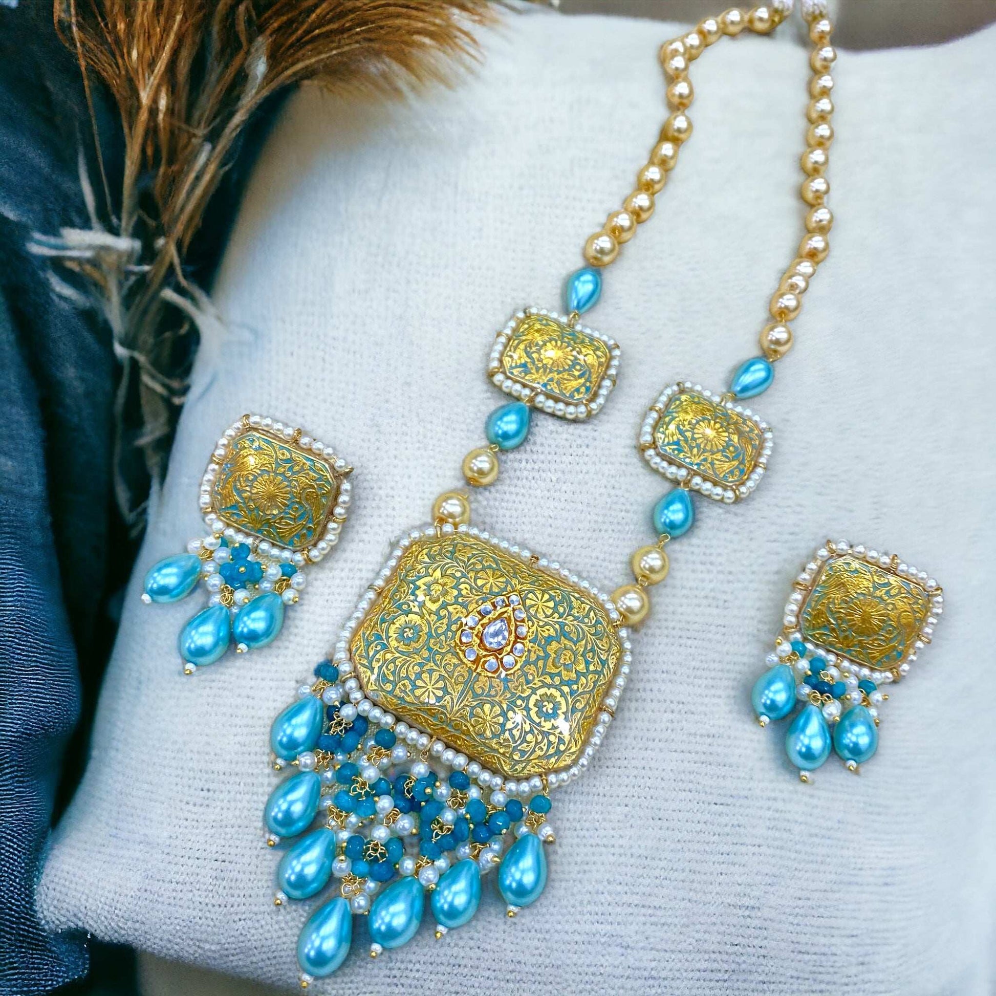 Rania Turquoise Meenakari
Necklace Set - Pirohee by parul sharma