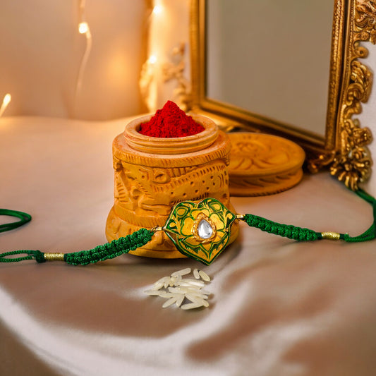 Blissful Gold Plated Green Kundan Meenakari Rakhi