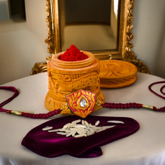 Traditional Gold Plated Kundan
Meenakari Magenta Rakhi