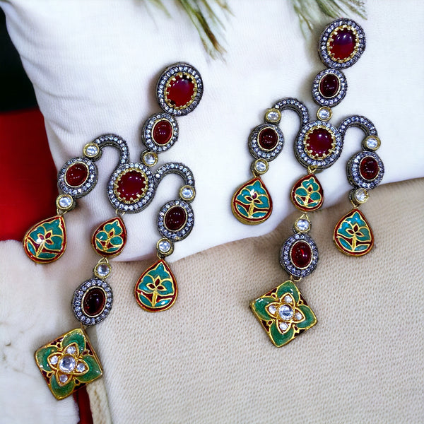 Fusion Elegance: Meenakari &
AD Ruby Red Earrings