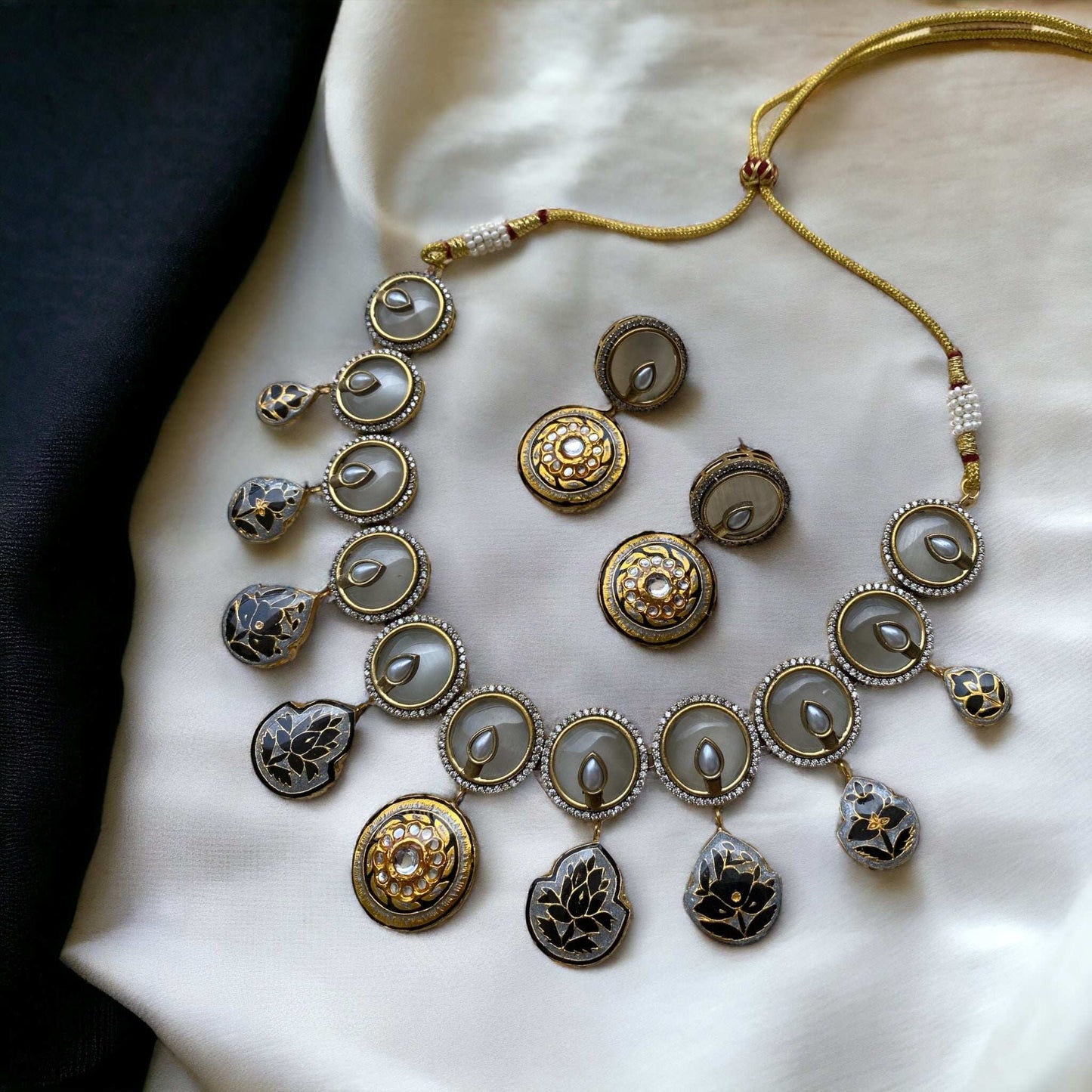 Amna Moon Grey Fusion
Necklace Set - Pirohee by parul sharma