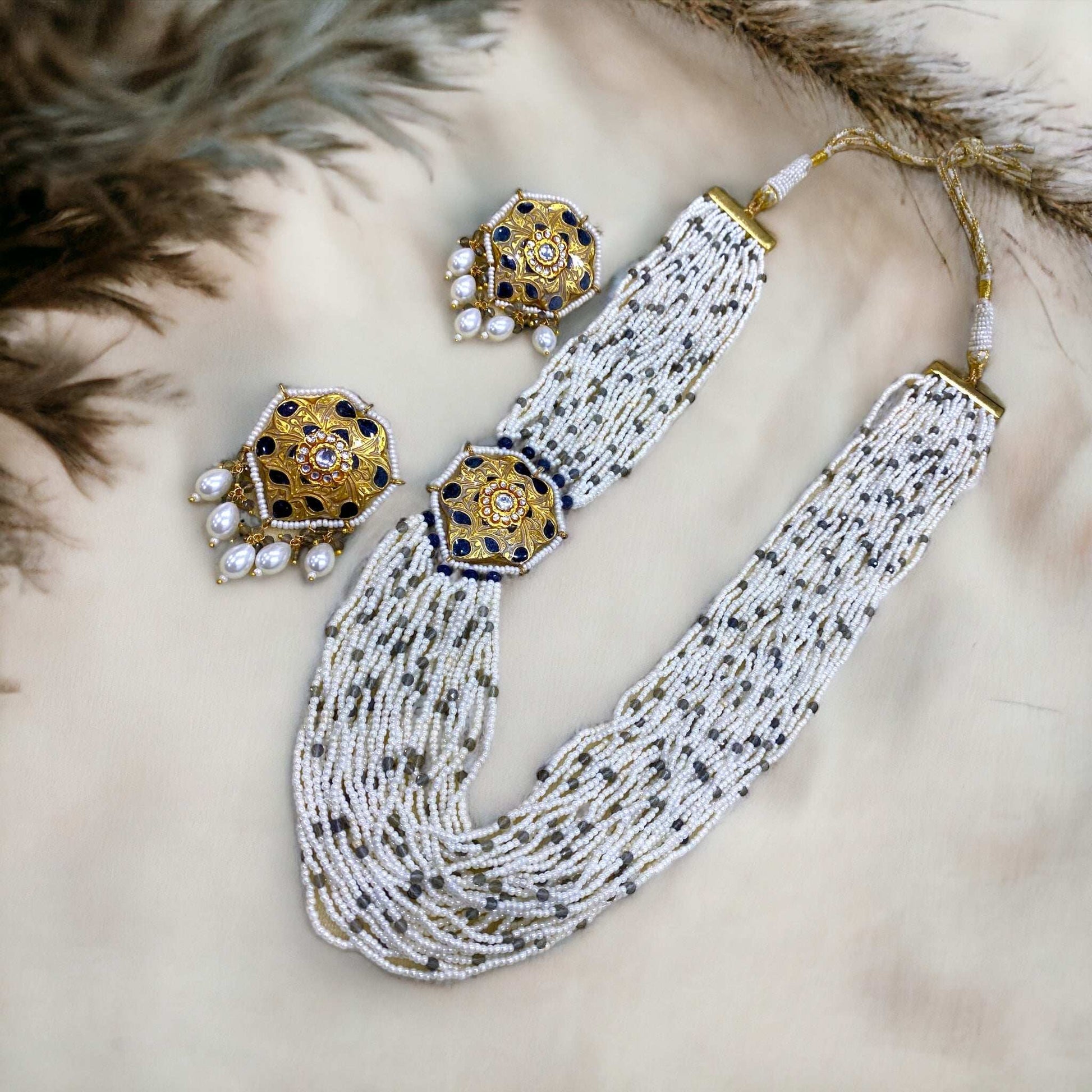 Saira Grey Meenakari
Necklace Set - Pirohee by parul sharma
